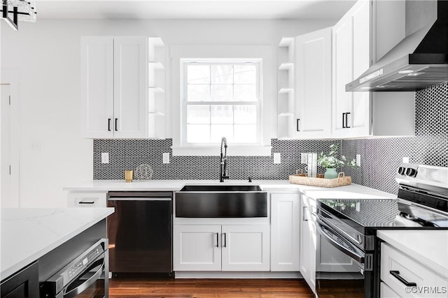 kitchen featuring dishwashing machine, wall chimney range hood, open shelves, and electric range oven