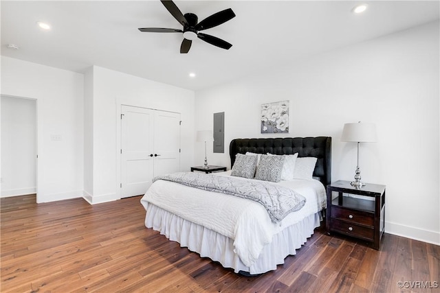 bedroom featuring wood-type flooring, baseboards, and recessed lighting