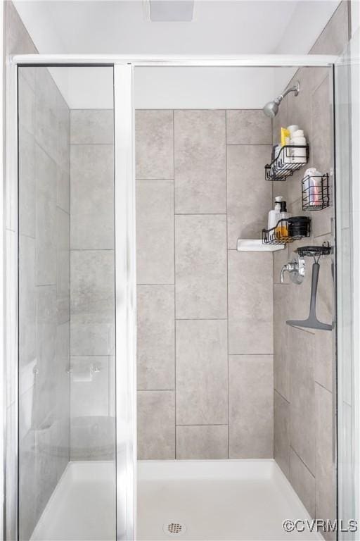 full bathroom featuring a stall shower