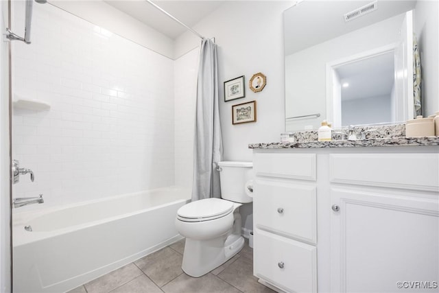 bathroom featuring visible vents, toilet, shower / bath combo with shower curtain, vanity, and tile patterned flooring