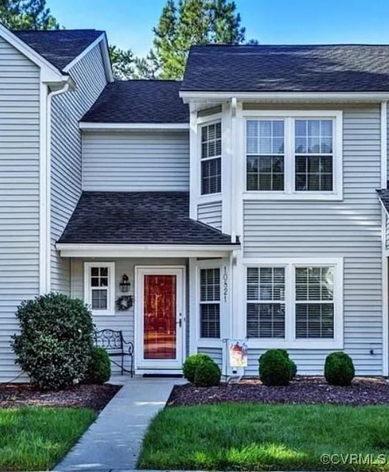 view of front of home featuring a shingled roof