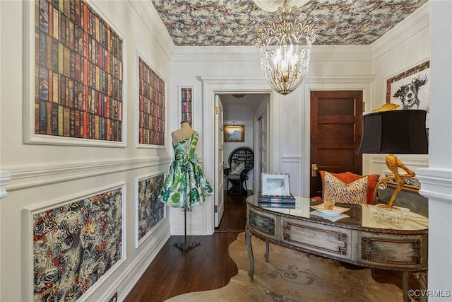 hallway featuring an ornate ceiling, crown molding, a notable chandelier, and wood finished floors