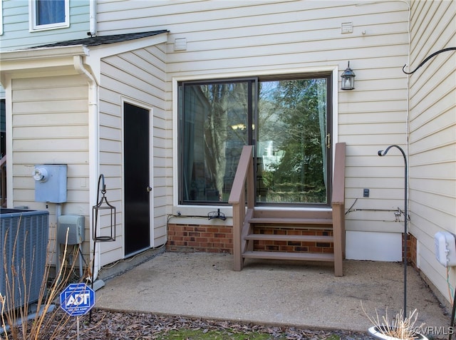 property entrance featuring central AC