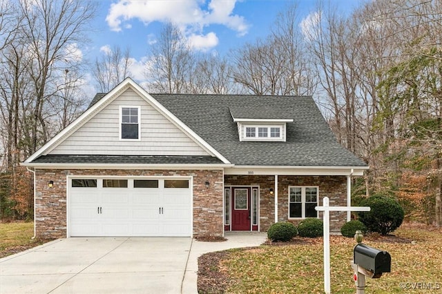 view of front of house with concrete driveway and roof with shingles