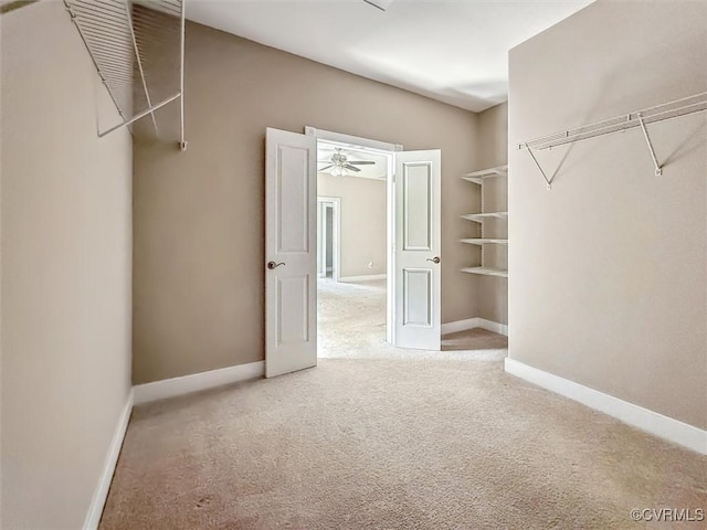 walk in closet featuring carpet floors