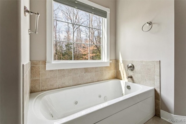 bathroom with a whirlpool tub