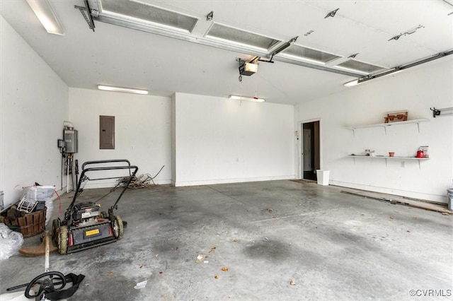 garage featuring electric panel and a garage door opener