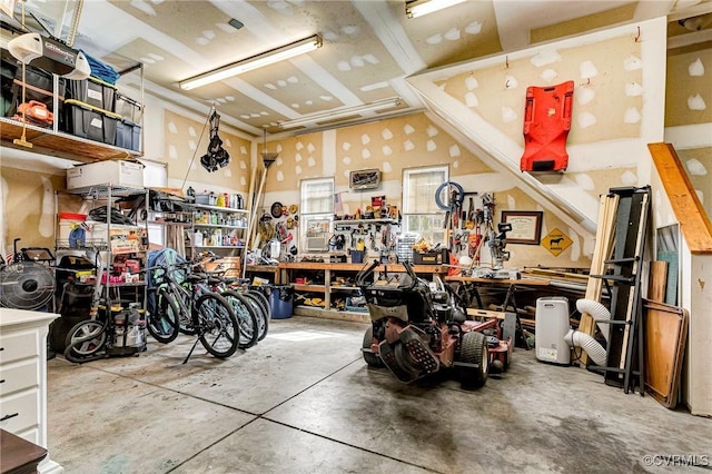 garage with a workshop area