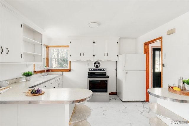 kitchen featuring marble finish floor, electric stove, light countertops, freestanding refrigerator, and open shelves