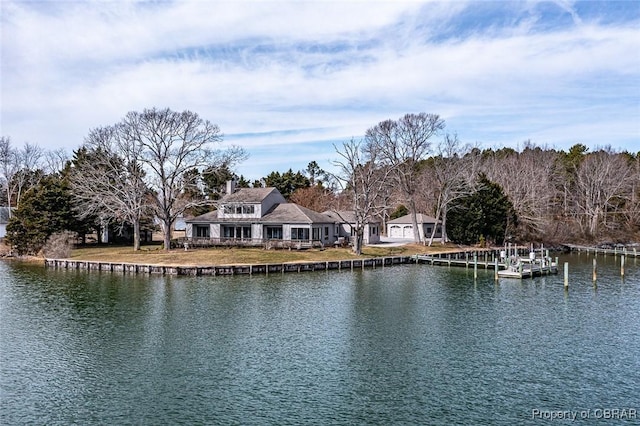 property view of water with a dock