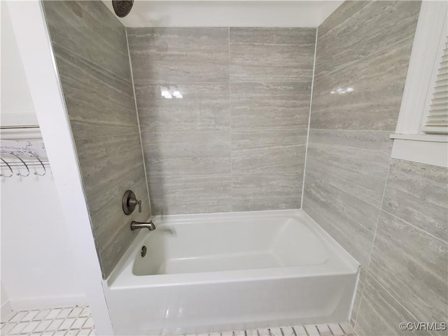 bathroom with shower / bathing tub combination