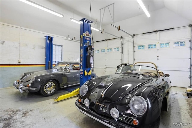 garage with concrete block wall