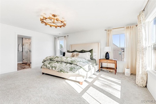 carpeted bedroom featuring baseboards