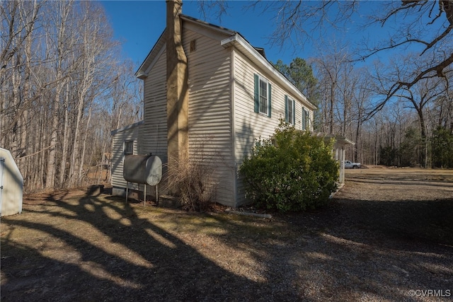 1566 Ballsville Rd, Powhatan, VA 23139 - view of side of home with a chimney