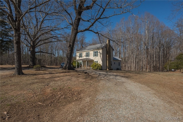 1566 Ballsville Rd, Powhatan, VA 23139 - view of front of property featuring dirt driveway, a metal roof, and a chimney