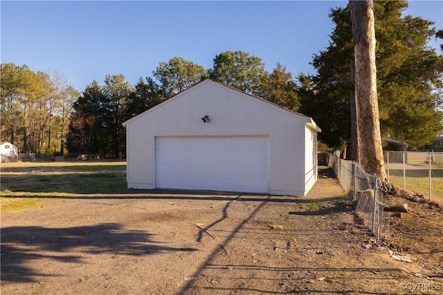 detached garage with fence