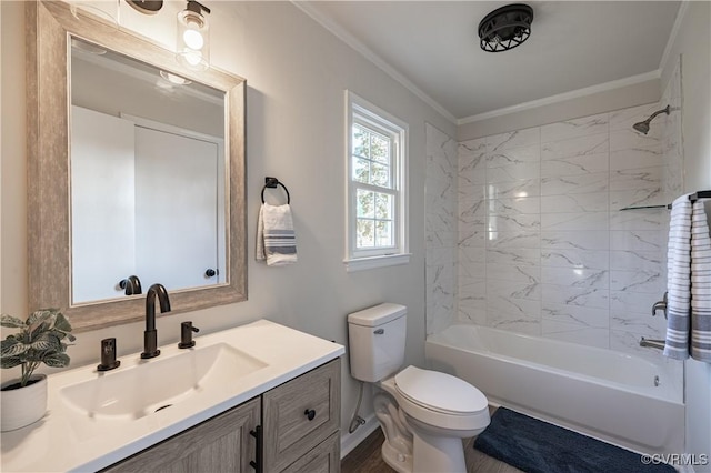 bathroom with toilet, shower / bath combination, crown molding, and vanity