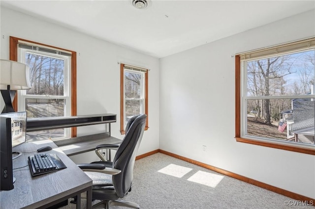 office area featuring carpet, visible vents, and baseboards