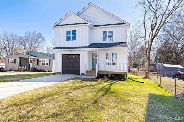 modern inspired farmhouse with covered porch, concrete driveway, a front yard, fence, and a garage