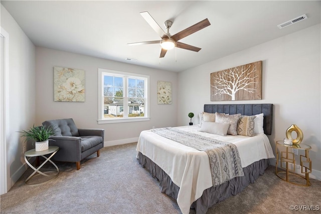 bedroom with carpet floors, baseboards, visible vents, and ceiling fan