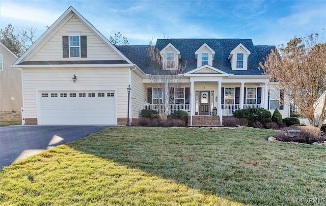 cape cod-style house featuring driveway, an attached garage, a front lawn, and a porch