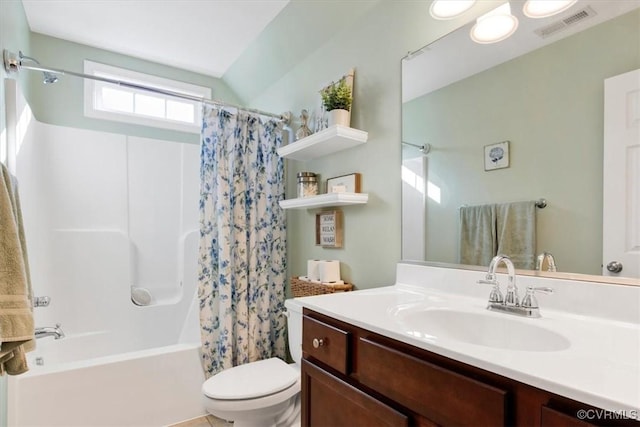 full bathroom with toilet, shower / tub combo, vanity, and visible vents