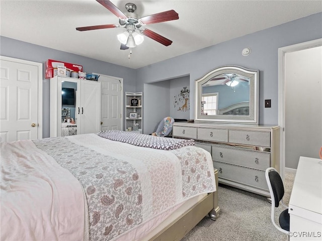 bedroom with carpet flooring and a ceiling fan