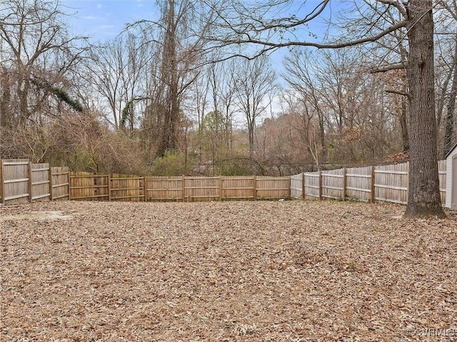 view of yard featuring a fenced backyard