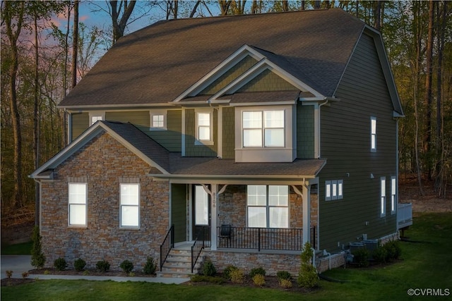 8106 Killbevan Dr, Chesterfield, VA 23838 - craftsman inspired home featuring covered porch, roof with shingles, and a lawn