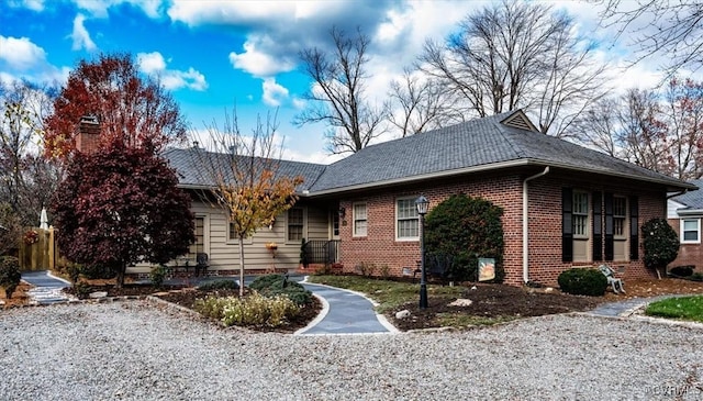 view of front of house featuring brick siding