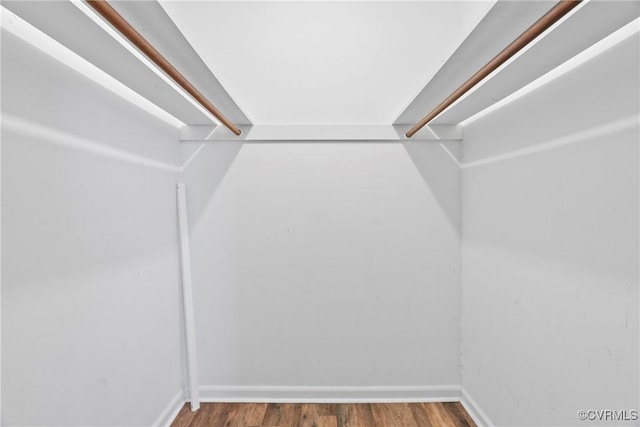 spacious closet with wood finished floors