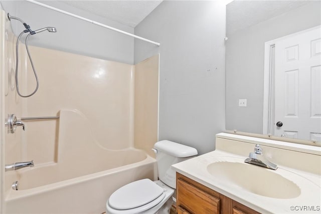 full bathroom featuring toilet, tub / shower combination, and vanity