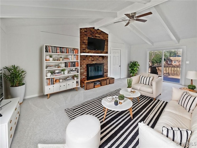 carpeted living room with lofted ceiling with beams, a fireplace, baseboards, and a ceiling fan