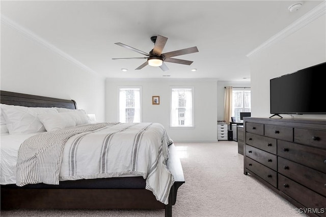 bedroom with light carpet, baseboards, ornamental molding, and a ceiling fan