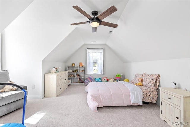 bedroom with ceiling fan, light carpet, visible vents, baseboards, and vaulted ceiling