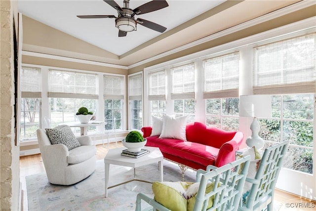 sunroom / solarium featuring vaulted ceiling and ceiling fan