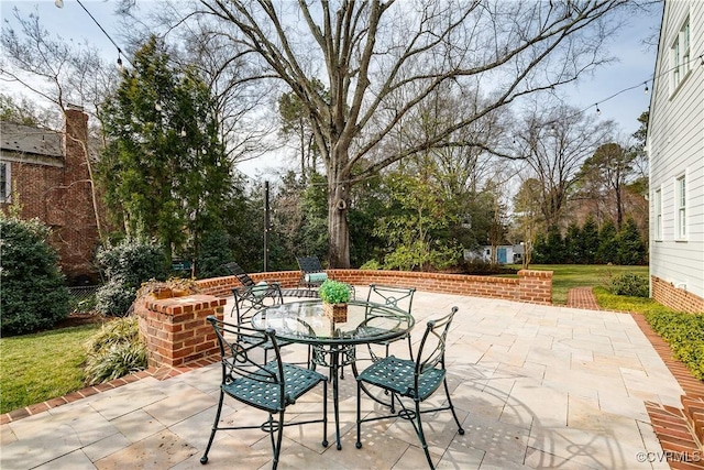 view of patio with outdoor dining space