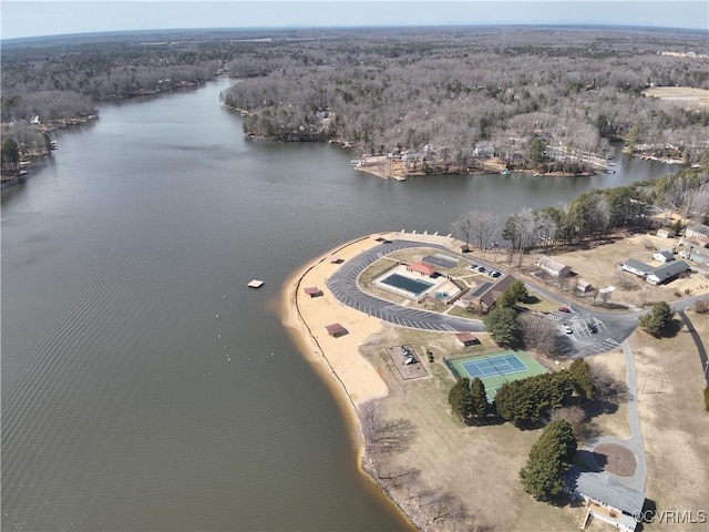 bird's eye view featuring a water view and a view of trees