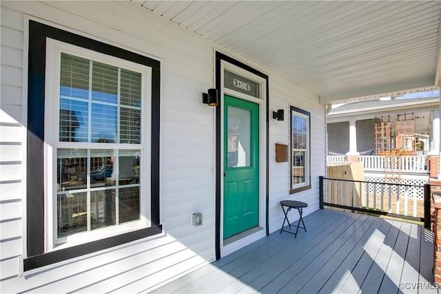 deck featuring covered porch