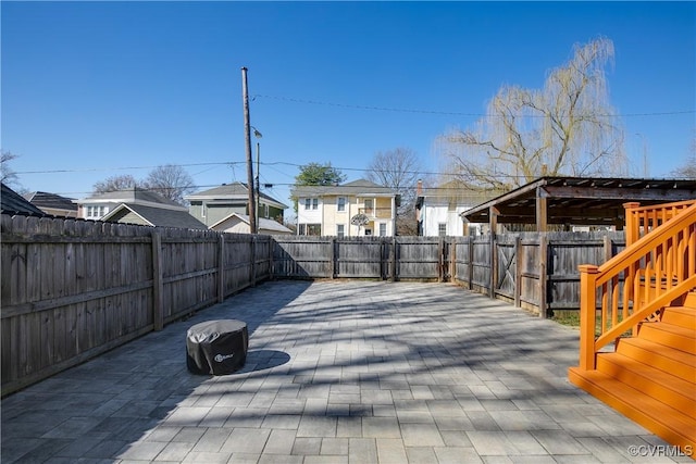 view of patio featuring a fenced backyard