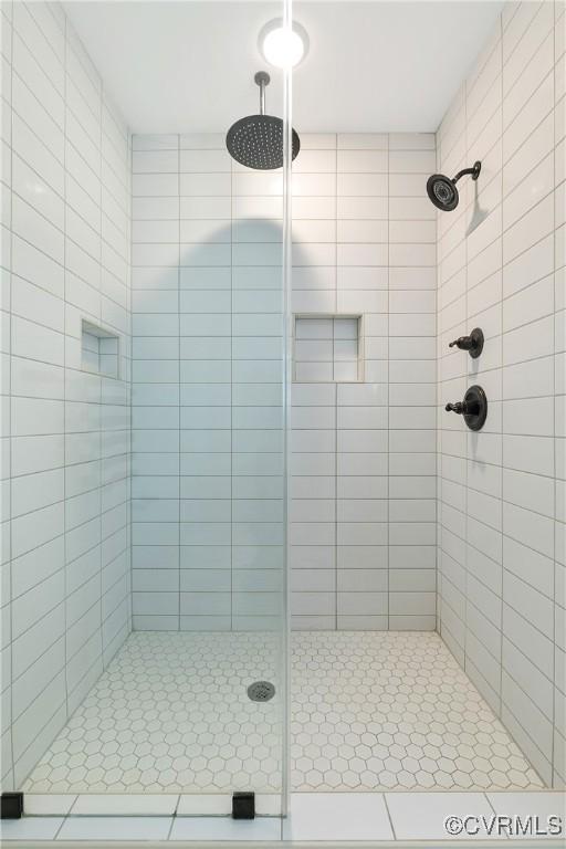 full bathroom with a stall shower