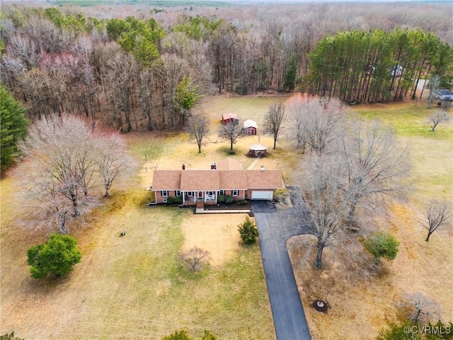 bird's eye view with a forest view