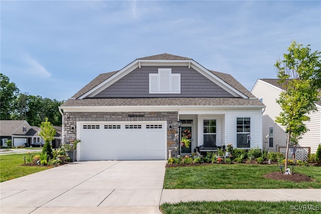 view of front of house featuring a garage, concrete driveway, a front lawn, and stone siding