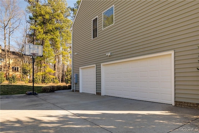 garage featuring driveway