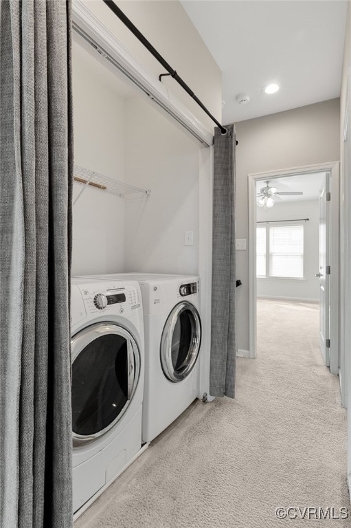 washroom with laundry area, light colored carpet, and washing machine and clothes dryer