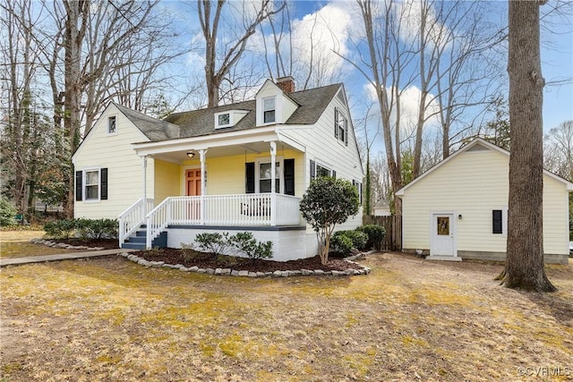 view of front of house with a porch and a chimney