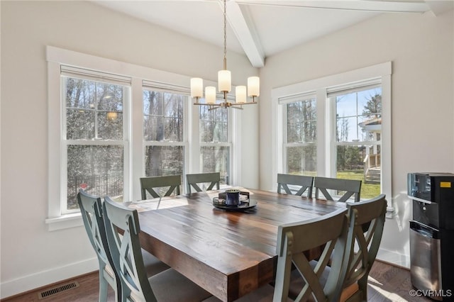 dining room featuring baseboards, visible vents, beamed ceiling, wood finished floors, and a notable chandelier