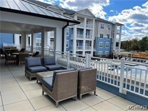 exterior space featuring an outdoor hangout area