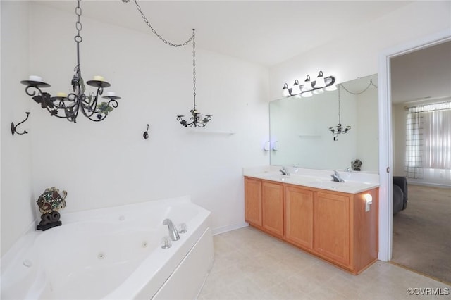 bathroom featuring double vanity, a sink, and a whirlpool tub