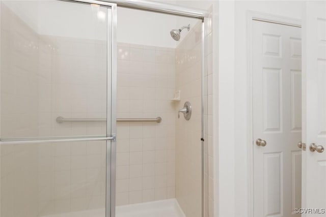 full bath featuring a stall shower